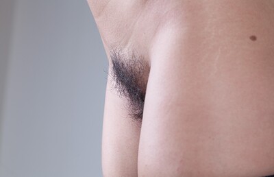 Ramira in Ramira strips naked in her living room from We Are Hairy