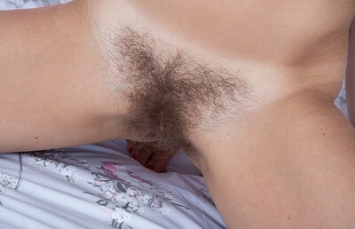 Anna Smith in Anna Smith strips naked on her bed from We Are Hairy