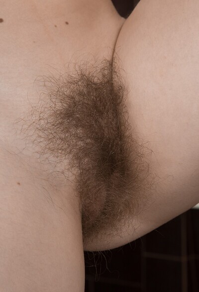 Aria in Aria strips nude by her washing machine from We Are Hairy