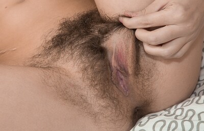 Christy in Christy reads in bed and undresses to play naked from We Are Hairy