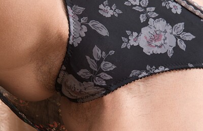 Emanuelle in Emanuelle strips and puts on show in bedroom from We Are Hairy