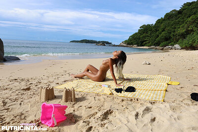 Lovely blonde Asian hottie Ninacola wearing a black bikini presenting her gorgeous figure with curvy ass