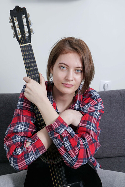 Lola in Nerd Student With Small Titties Lola Plays The Guitar from Domingo View