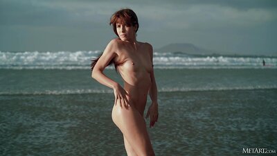 Stunning Leni Doll spends the day at the beach showing off her lovely figure before getting all wet