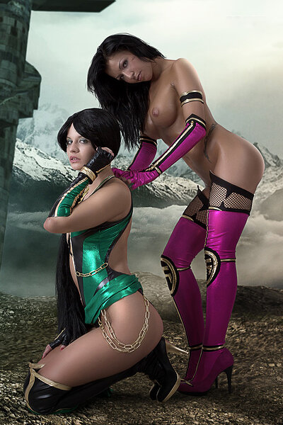 Hot lesbians Ginger and Mea Lee having fun and enticingly posing dressed as Mileena and Kitana from Mortal Kombat