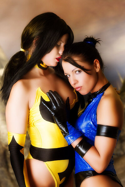 Amazing babes Ginger and Mea Lee provocatively pose together while cosplaying characters from the game Mortal Kombat