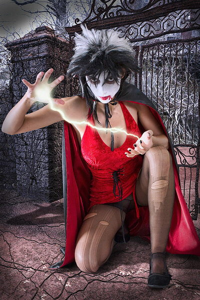 Lustful and seductive black hair girls cosplaying as Dracula strips on the floor exposing her outstanding natural figure with perky boobs