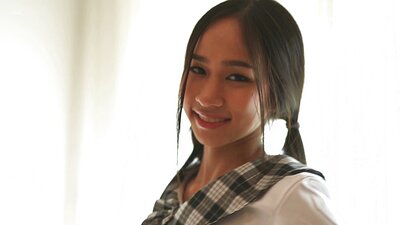 Naughty schoolgirl Mayuko bares her youthful physique with hard nipples before pleasuring herself using fingers