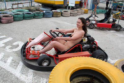 Naughty Alisa goes carting in her birthday suit exposing her lovely slender body with ample titties