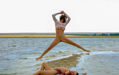 Aglaia X and Sophronia Q in Aglaia Hanging Out On The Beach from Stunning 18