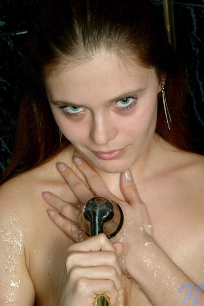 Synthia in Bathroom showering from Nubiles