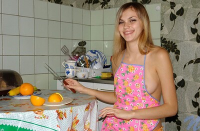 Katrina in Orange eating from Nubiles