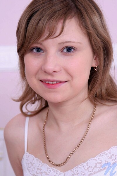 Carley in Pink skirt from Nubiles
