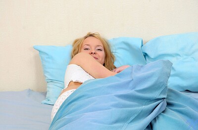 Natalia in Bed strip tease from Nubiles