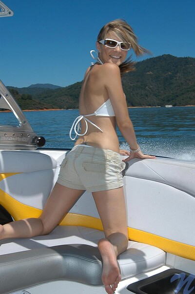 A fine-ass broad strips down on a vessel and flaunts her naked body.