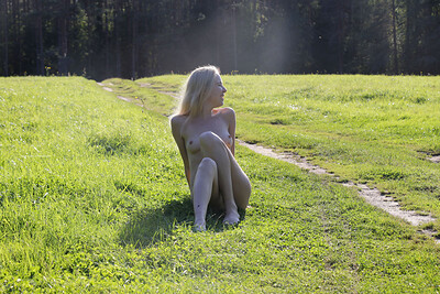 Isabel in Field Of Blue from Nude In Russia