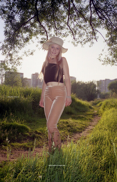 Elsa in Park Undressing from Nude In Russia