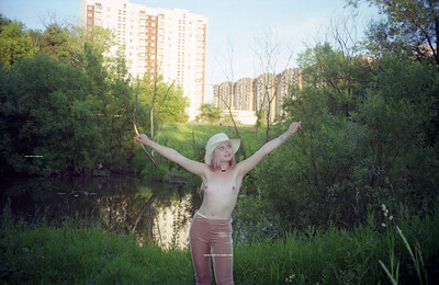 Elsa in Park Undressing from Nude In Russia