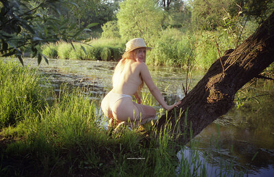 Elsa in Park Undressing from Nude In Russia