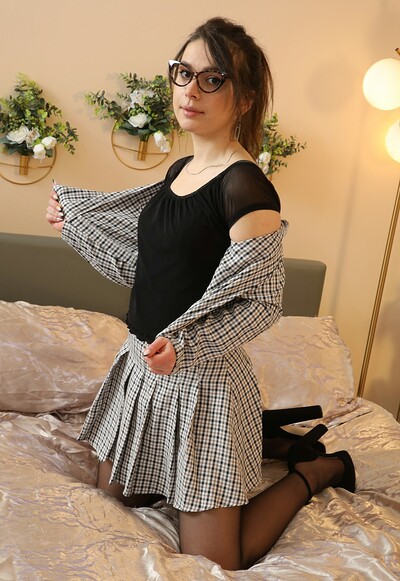Gia in Pleated Miniskirt Black Stockings from Only Secretaries
