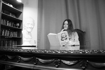 Natalia N in Reading Her Books from Nude In Russia