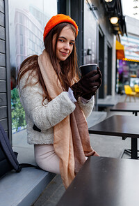 Girls in winter clothing outside