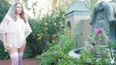 This hot, curly-haired bride slowly strips down to savor her nakedness, then tantalizes on-camera with a big, sexy booty and irresistible hourglass figure out in nature's embrace.