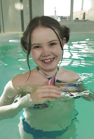 After emerging from the pool, Rebecca Nixon rubbed her wet, dripping pussy.