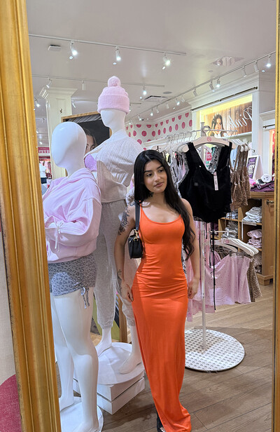 Angel flashes her tits in the mall and then, in the garage, fucks herself deep with a dildo until she comes.