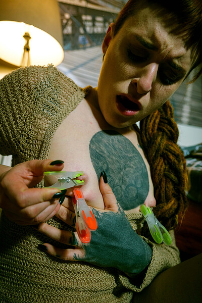 Bryla in Lets The Pins Bite Her Tattooed Skin from Domingo View