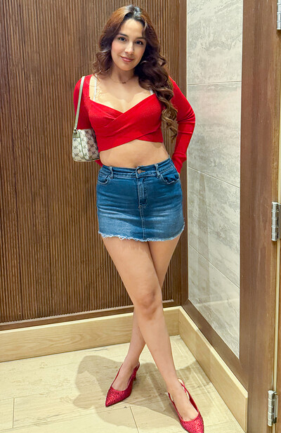 Paris's denim skirt offers constant, explicit views up to her exposed sex as she flaunts her body in red heels.