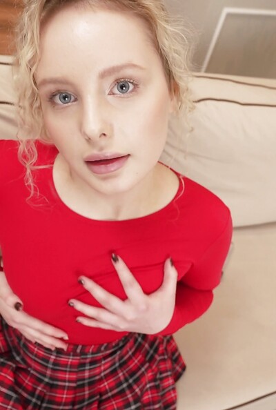 The blonde teen quickly tries her new silver toy while masturbating on the couch.