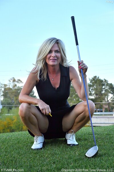 She pushes a golf ball into her tight vagina, where it gets stuck inside her hole.