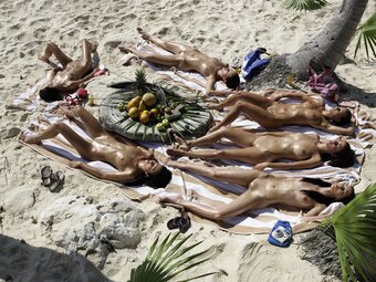 Sunbathing Group Of Gals
