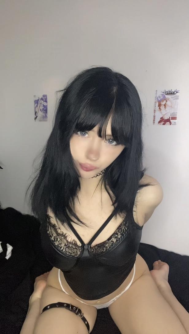 Mimi's black lace top is teasing her big tits, her blue eyes are filled with eager anticipation.