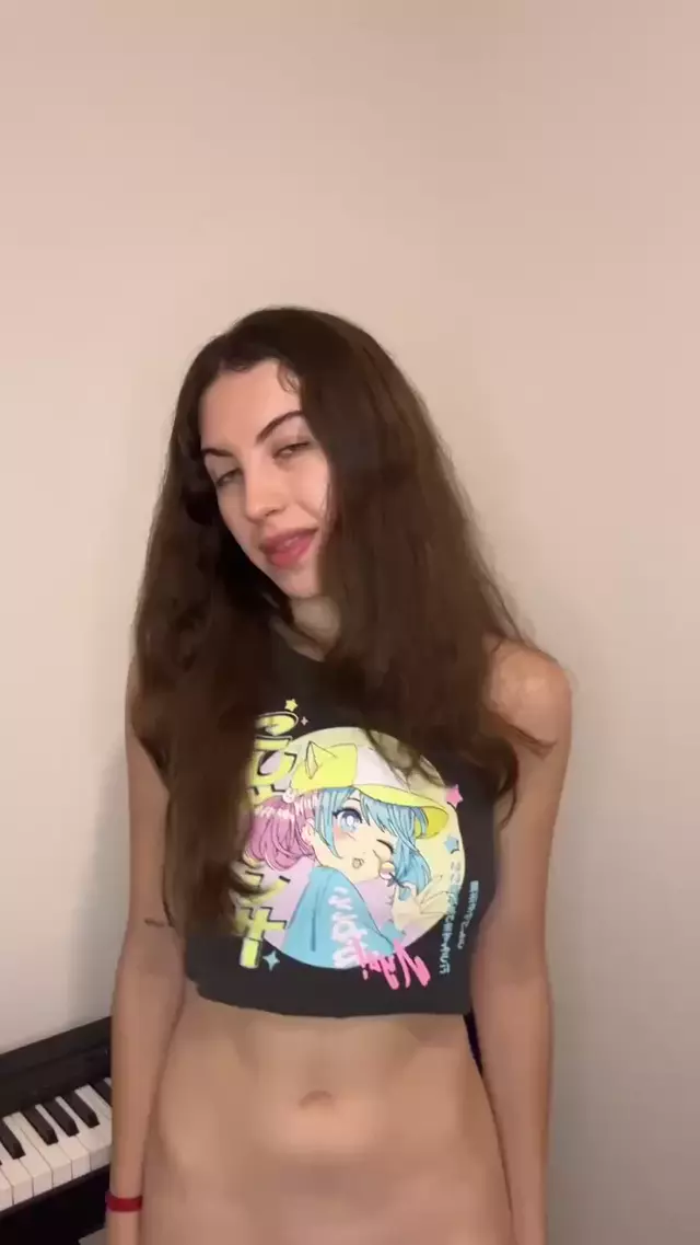 Amber James's bare pussy is teasing, her long brown hair framing her sexy, confident smile.